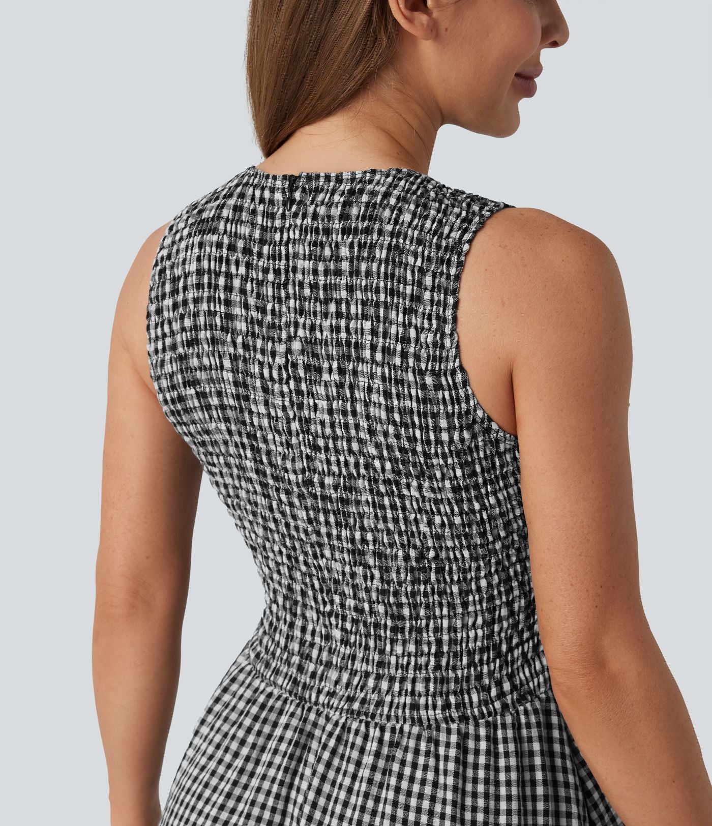 Robe midi fluide casual col rond sans manches à smocks et carreaux aspect lin avec poches