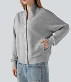 Sweat-shirt col V à manches longues avec boutonnage et poches