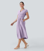 Robe midi Breezeful™ col V manches courtes à liens dans le dos séchage rapide avec poches latérales