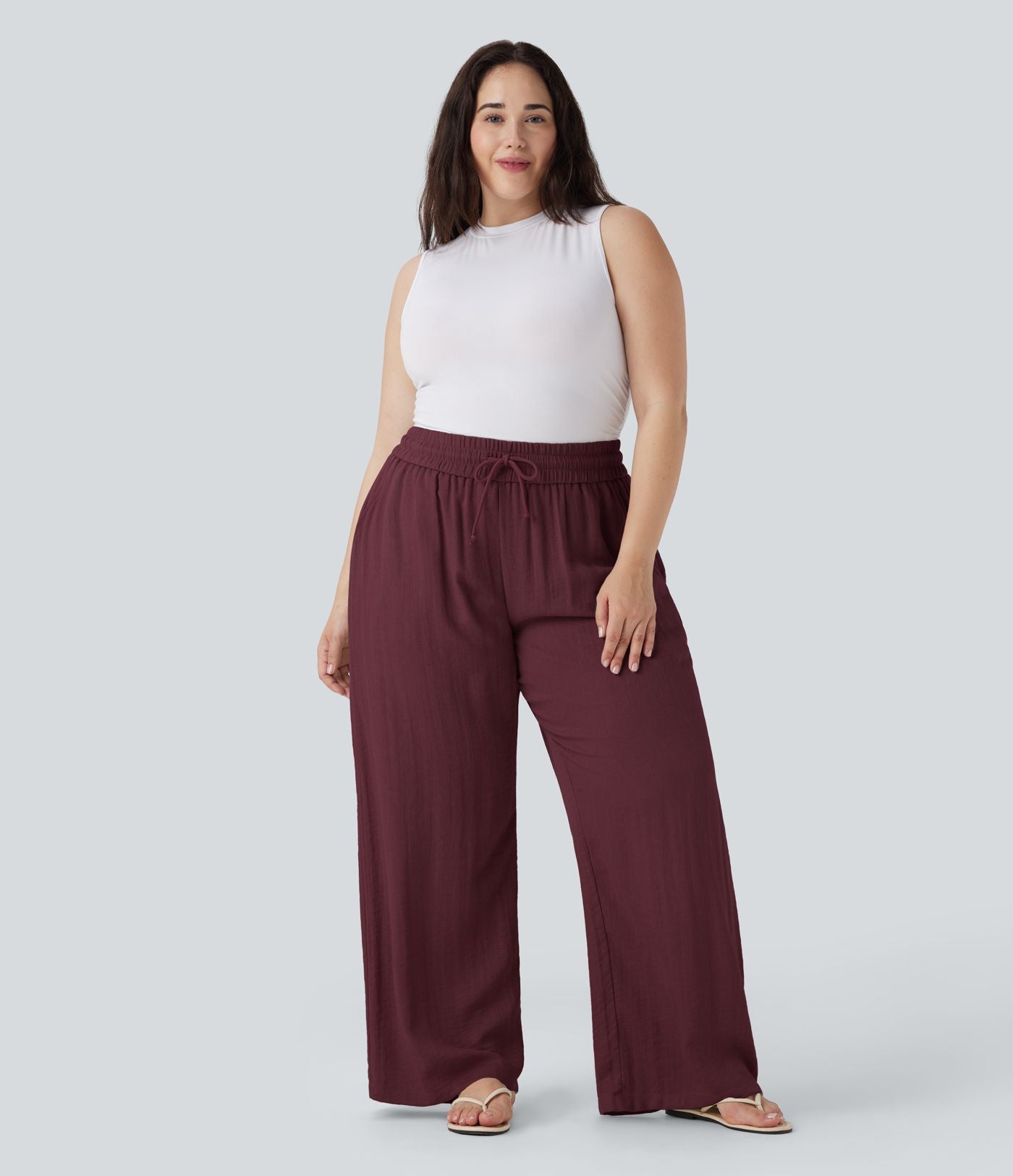 Pantalon décontracté grande taille large fluide taille haute effet lin avec cordon de serrage et poches