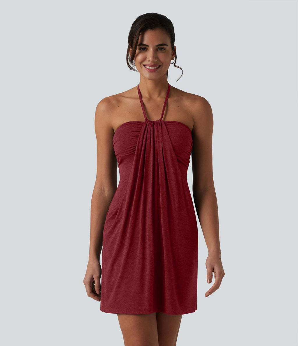 Robe resort mini dos nu à col licou avec lien noué dans le dos et poches