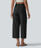 Pantalon casual court en coton et lin taille haute coupe ballon avec cordon de serrage et poches