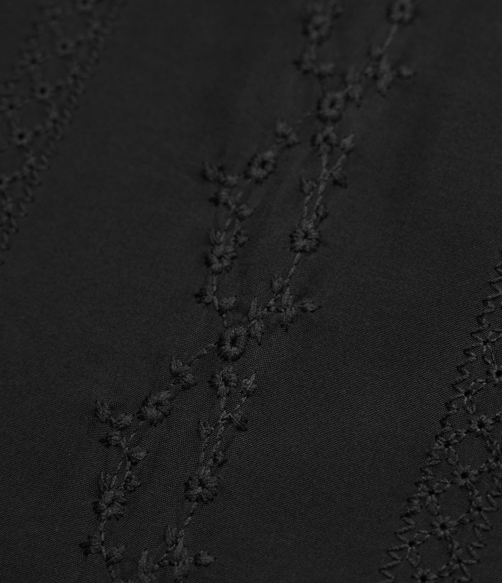 Jupe mini évasée 2-en-1 taille haute broderie style vacances