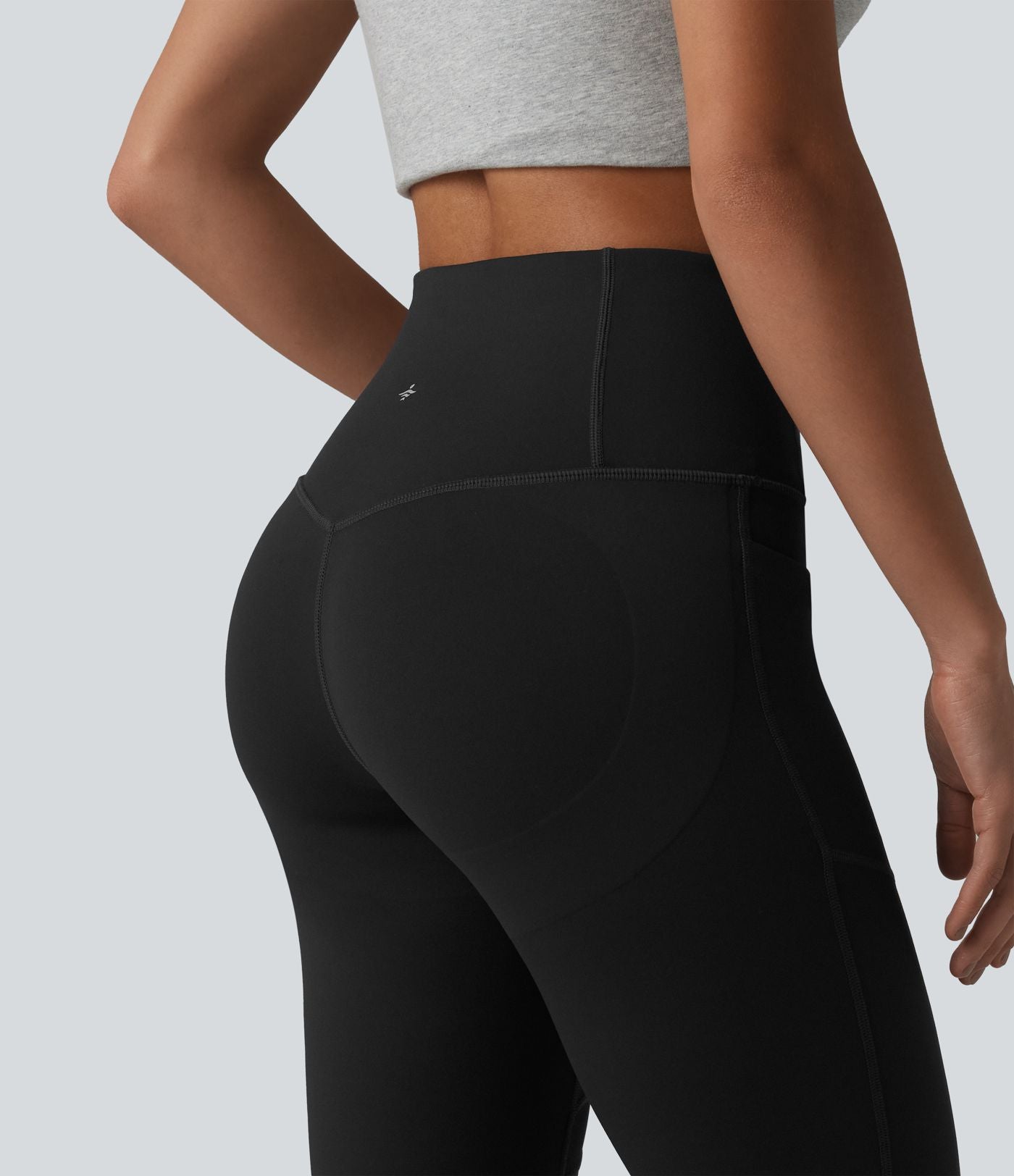 Legging décontracté DayStretch taille haute gainant et galbant les fesses, avec poche, empiècement en maille contrastée et coupe évasée