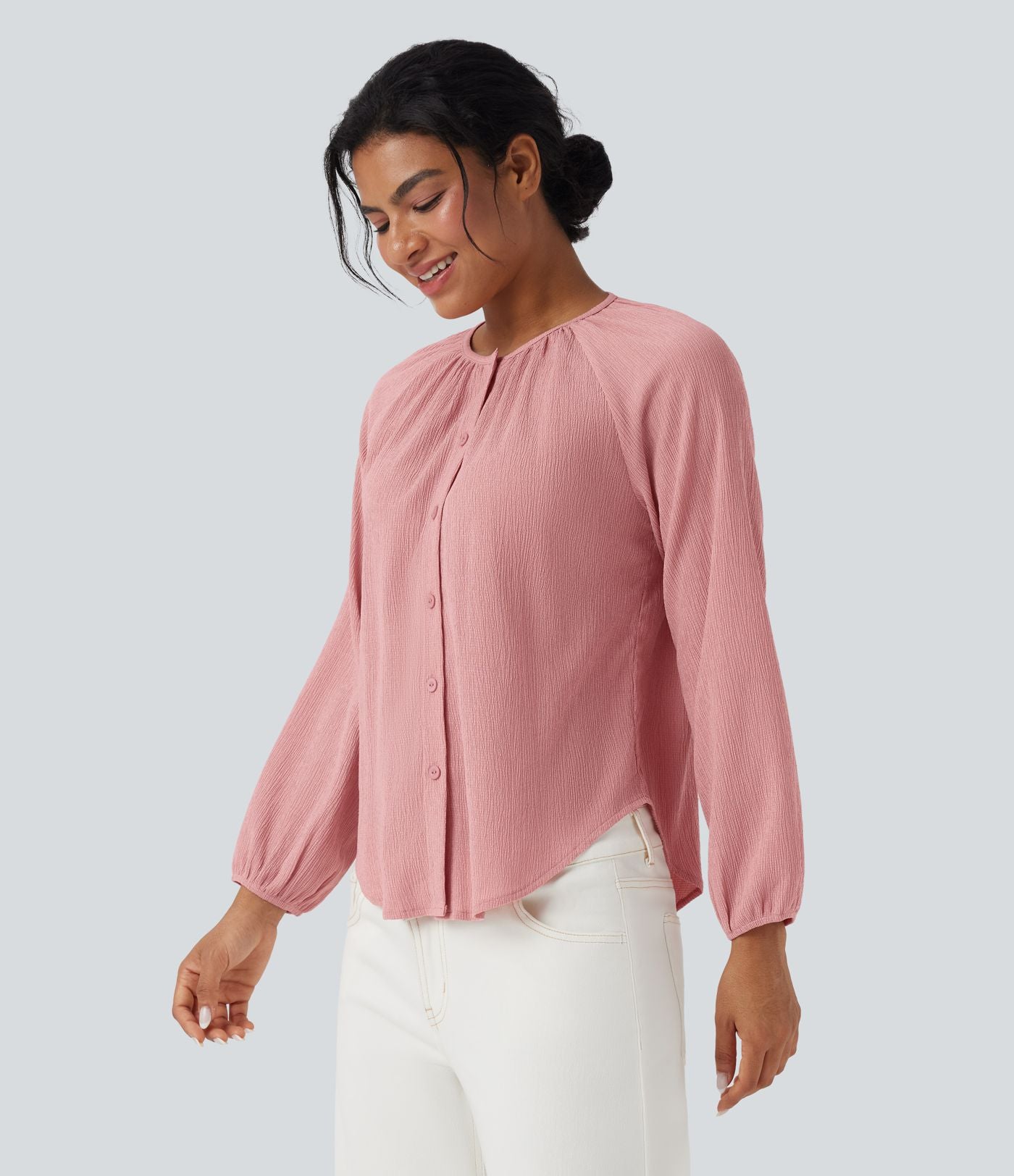 Blouse texturée col rond manches longues ourlet arrondi