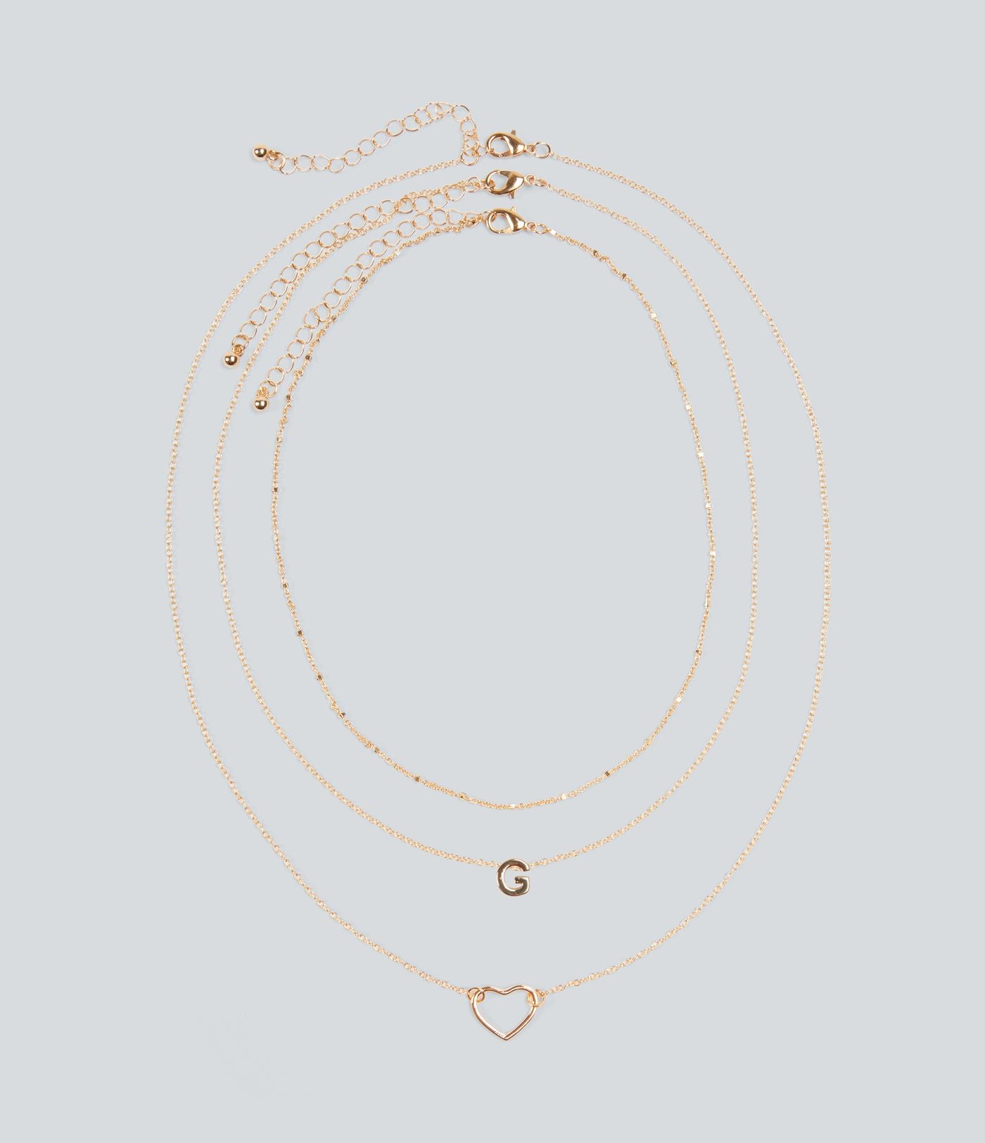 Ensemble de colliers pendentifs lettre + cœur