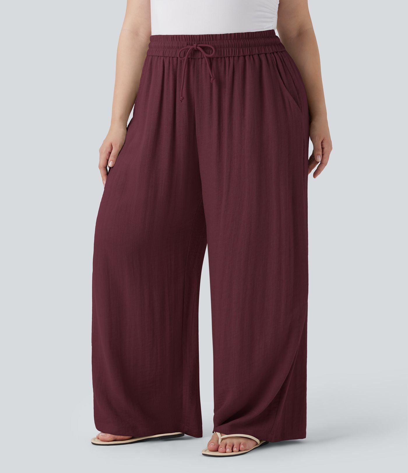 Pantalon décontracté grande taille large fluide taille haute effet lin avec cordon de serrage et poches