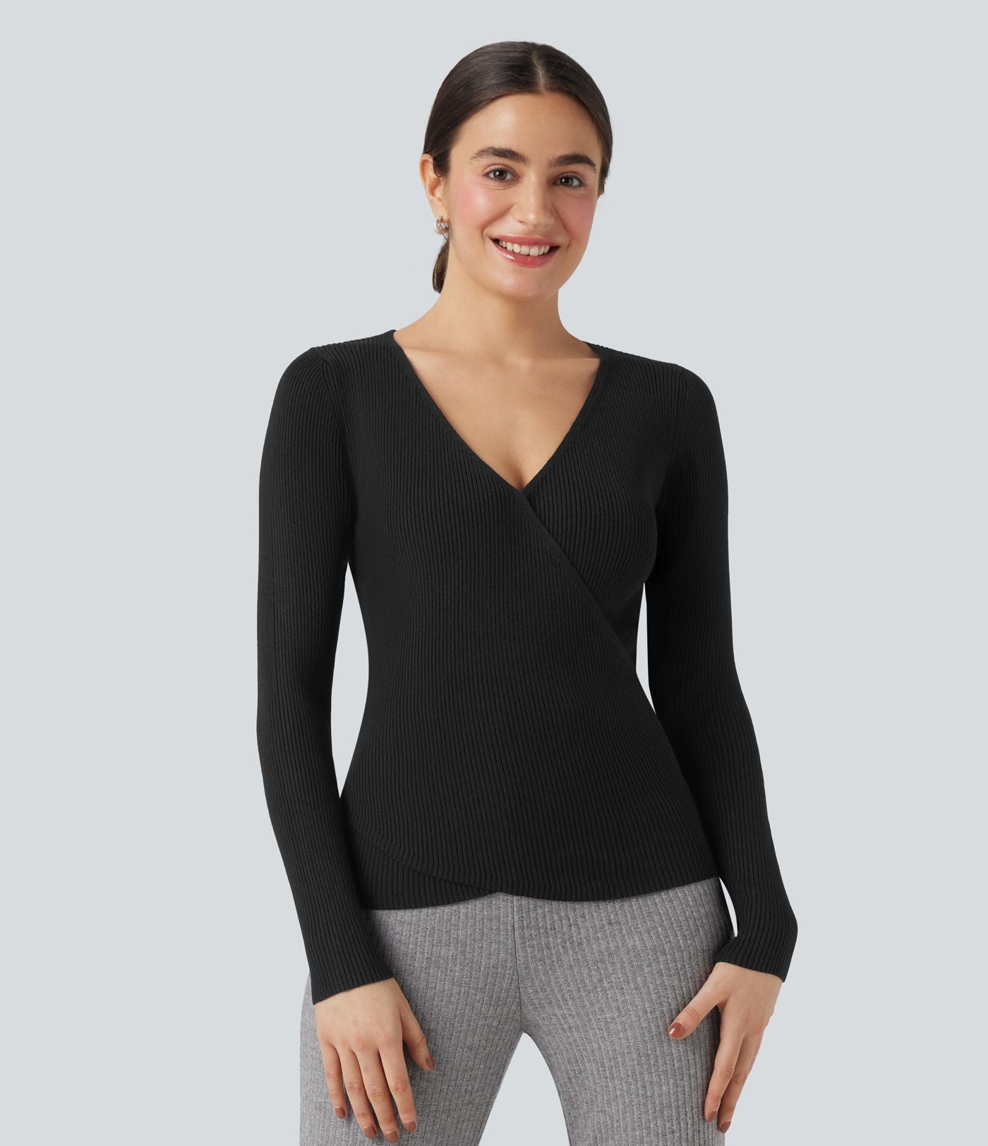 Pull col V manches longues croisé ajusté