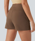 Short tailleur plissé taille haute avec poches
