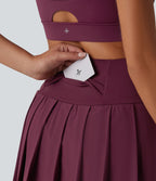 Breezeful™ Jupe mini sport 2 en 1 plissée taille haute mesh contrasté séchage rapide avec poches
