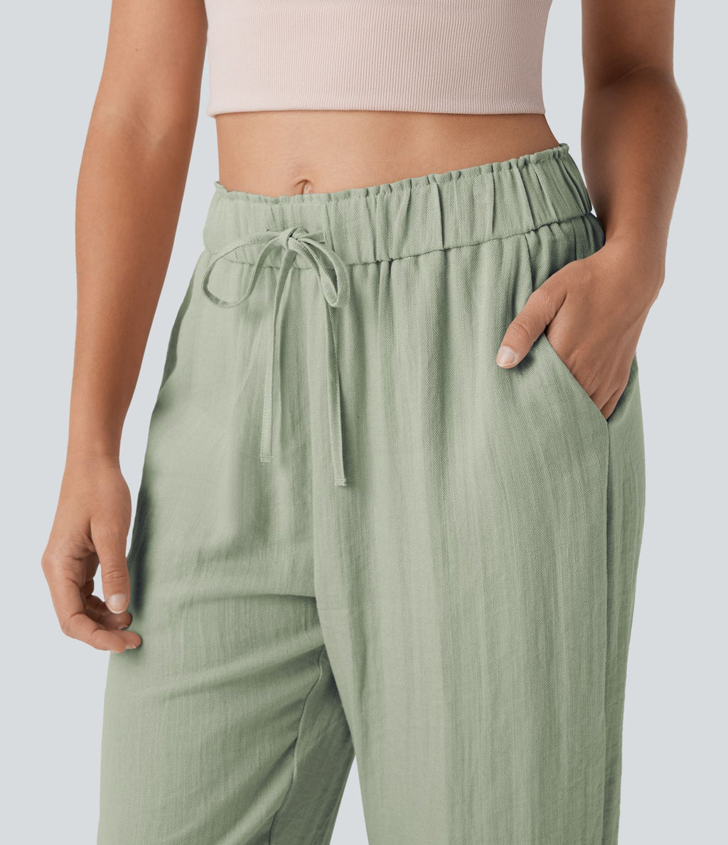 Jogging fuselé taille mi-haute à cordon avec poches
