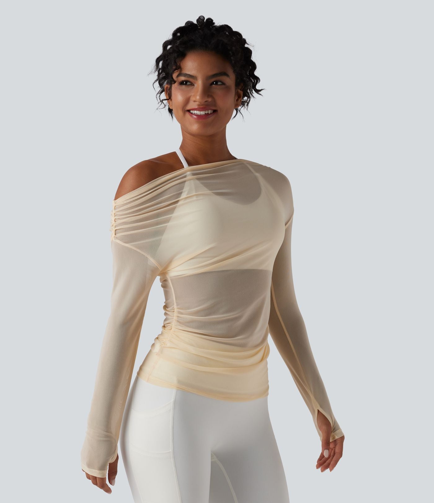 Haut de yoga asymétrique manches longues mesh avec ouverture pouce