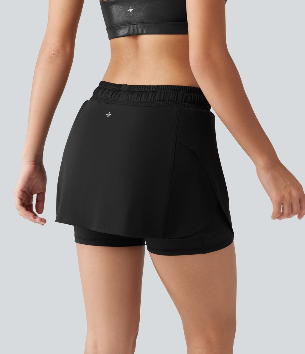 Jupe-short de sport mini SoftlyZero™ Airy taille mi-haute à ourlet croisé, toucher frais, cordon ajustable et poches