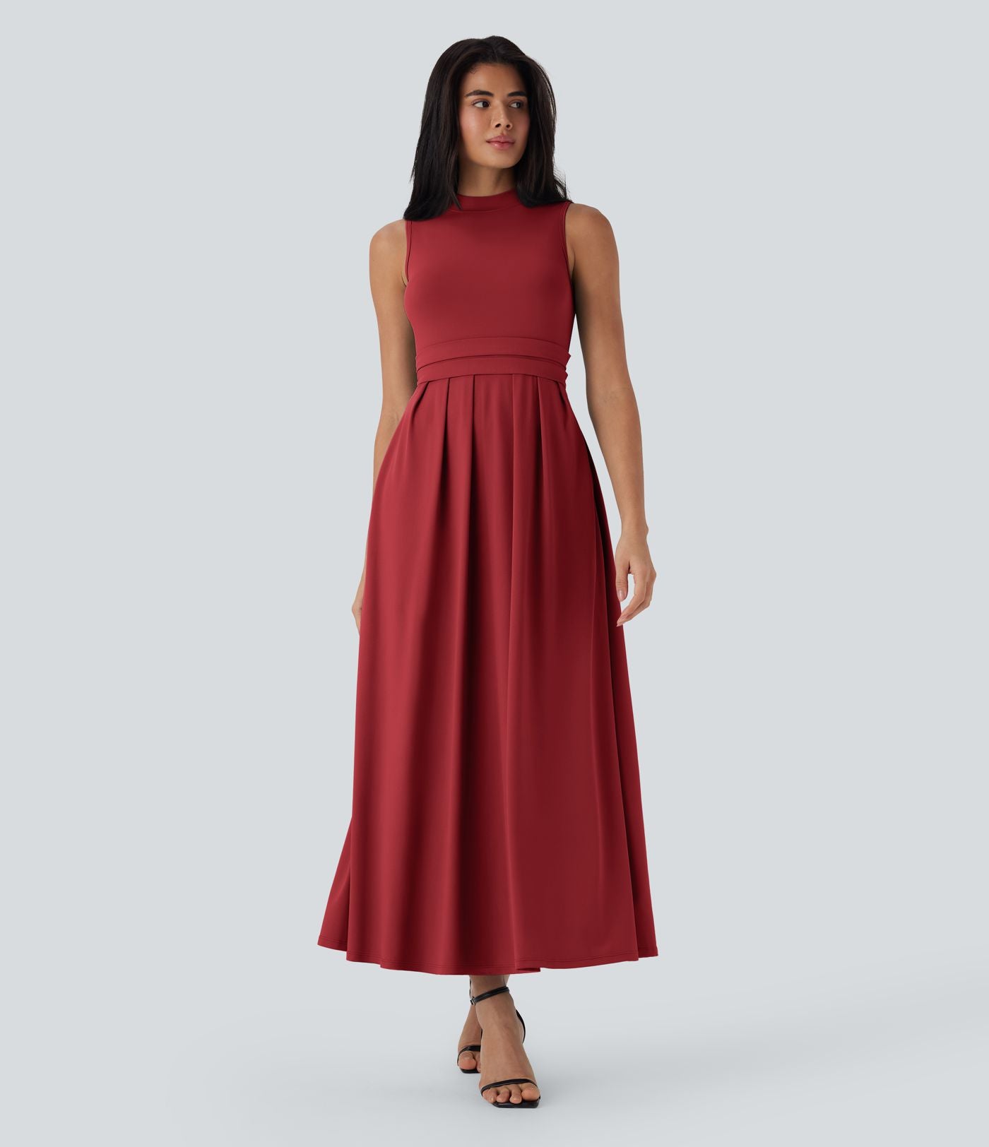 Robe longue décontractée sans manches à col montant, coupe évasée et poches latérales