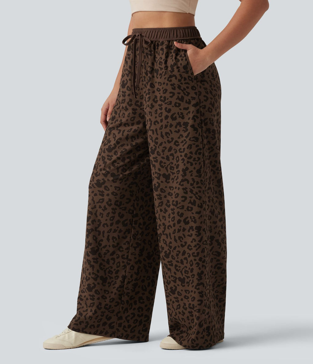 Pantalon casual large gaufré imprimé léopard taille haute avec cordon de serrage et poches