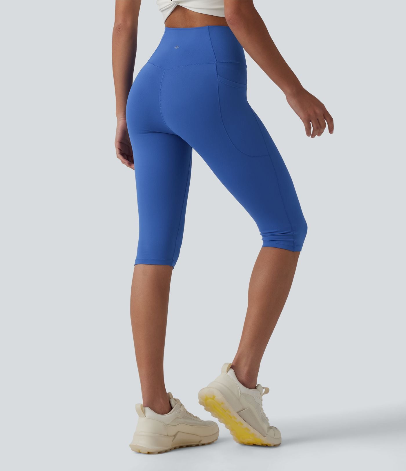 Legging de yoga corsaire SoftlyZero™ taille haute croisé avec poches - UPF50+