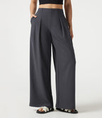 Pantalon casual ample toucher lin taille mi-haute à poches