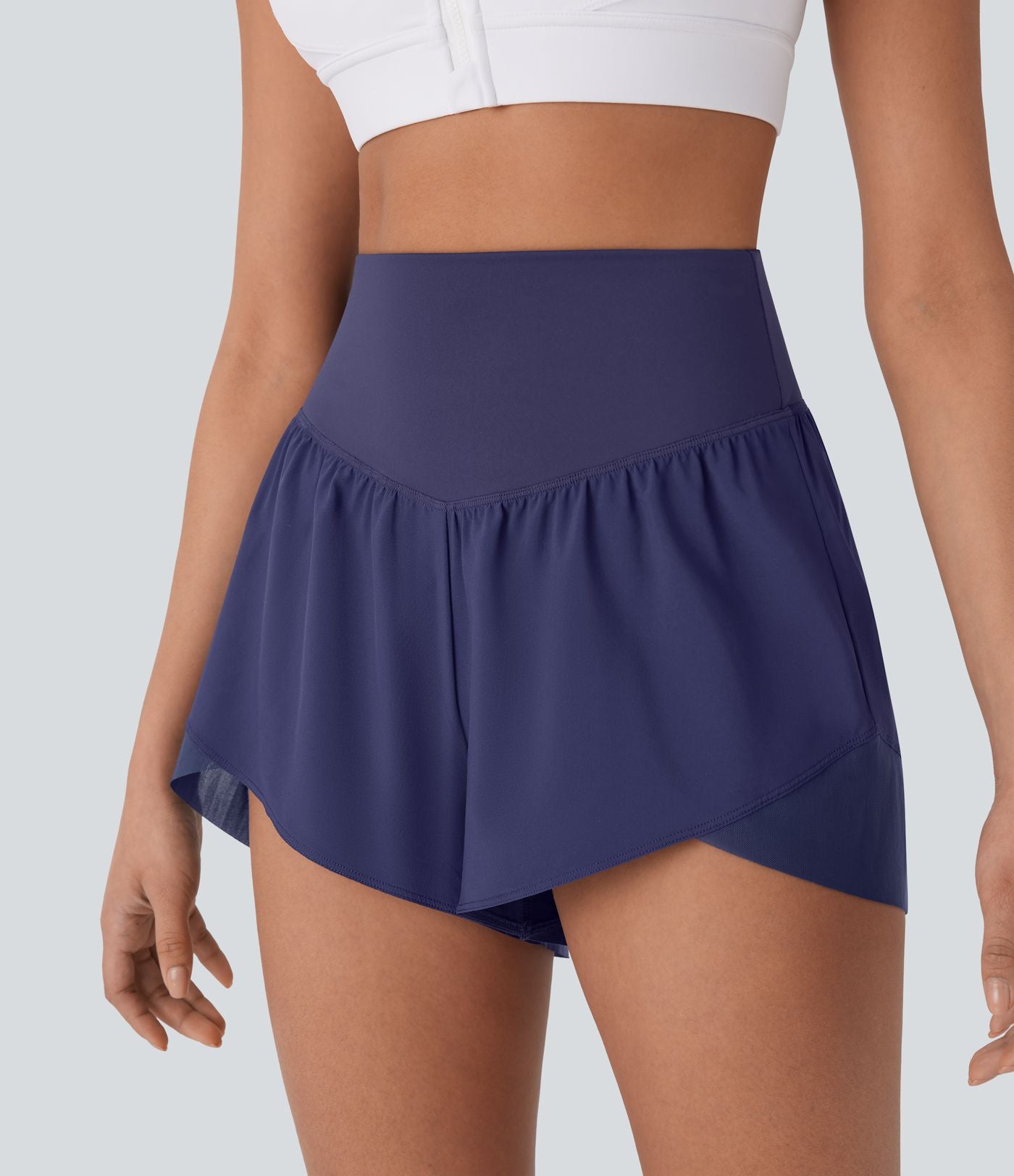 Breezeful™ Short yoga taille haute avec poche arrière ourlet croisé séchage rapide