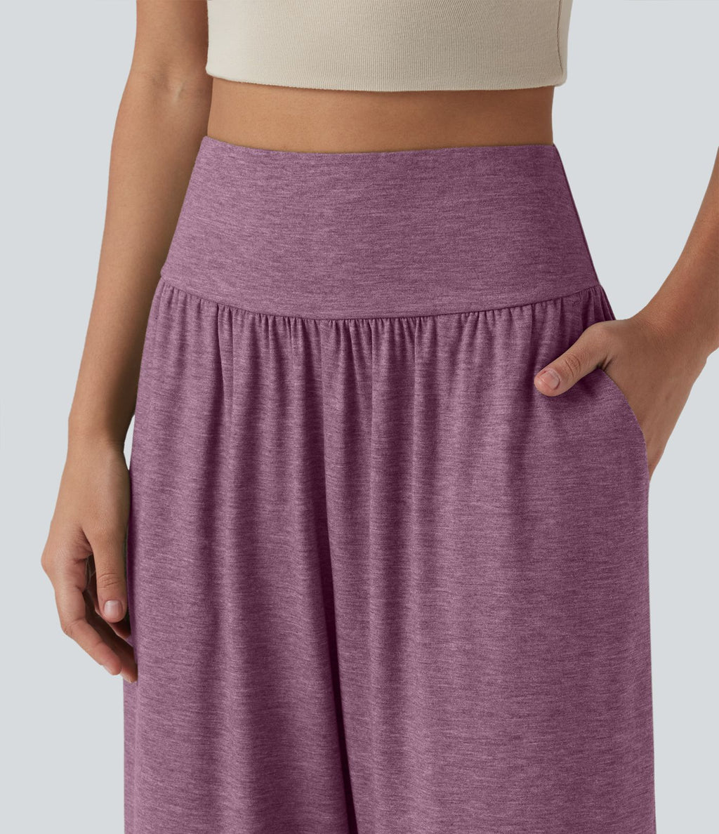 Pantalon décontracté taille haute gainant avec ourlet arrondi et poches