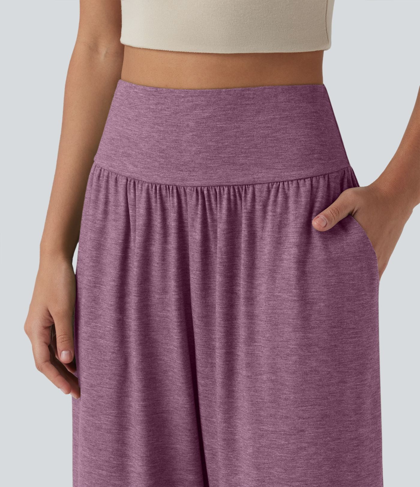 Pantalon décontracté taille haute gainant avec ourlet arrondi et poches