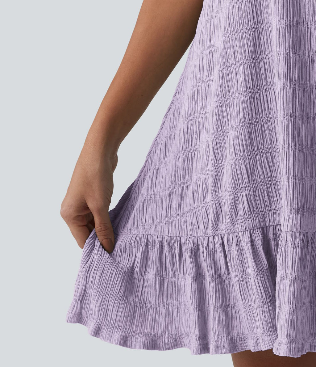 Robe courte décontractée sans manches à col rond, soutien-gorge intégré et ourlet à volants