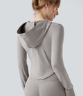 Veste yoga à capuche zippée à manches longues avec passants pouces et ourlet arrondi sans couture OneForm Seamless Flow