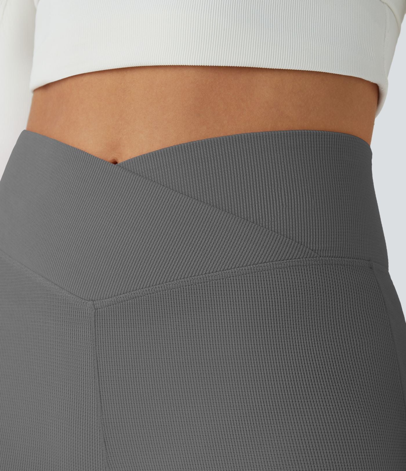 Pantalon décontracté évasé en maille gaufrée, taille haute, avec poches croisées