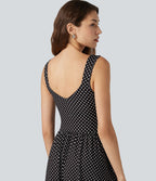 Robe fluide décontractée midi sans manches dos nu croisée à pois avec poches