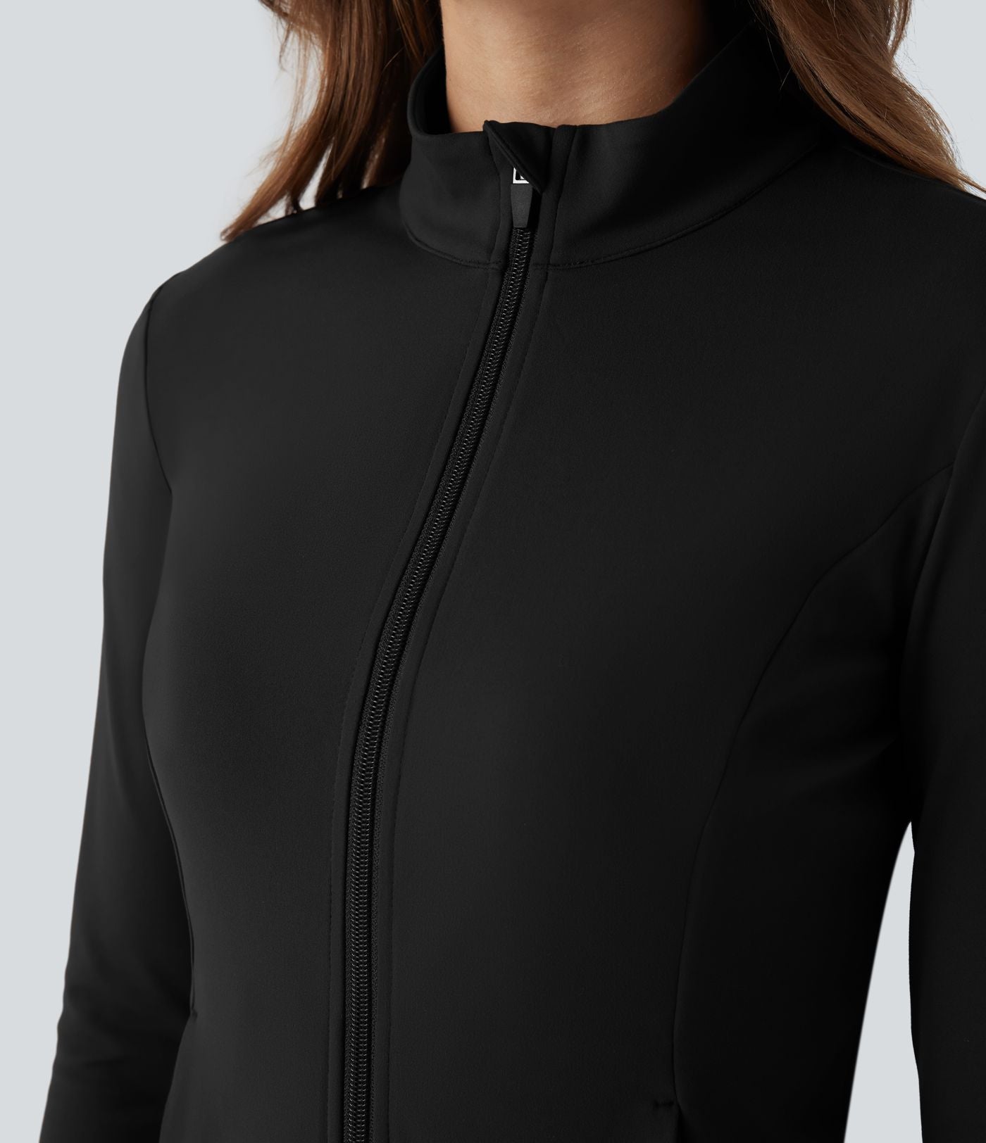 Veste ajustée col montant zippée avec passants pouces et ourlet à volants DayStretch avec poches