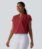 Blouse esprit bureau ample défroissage facile, col V et manches chauve-souris