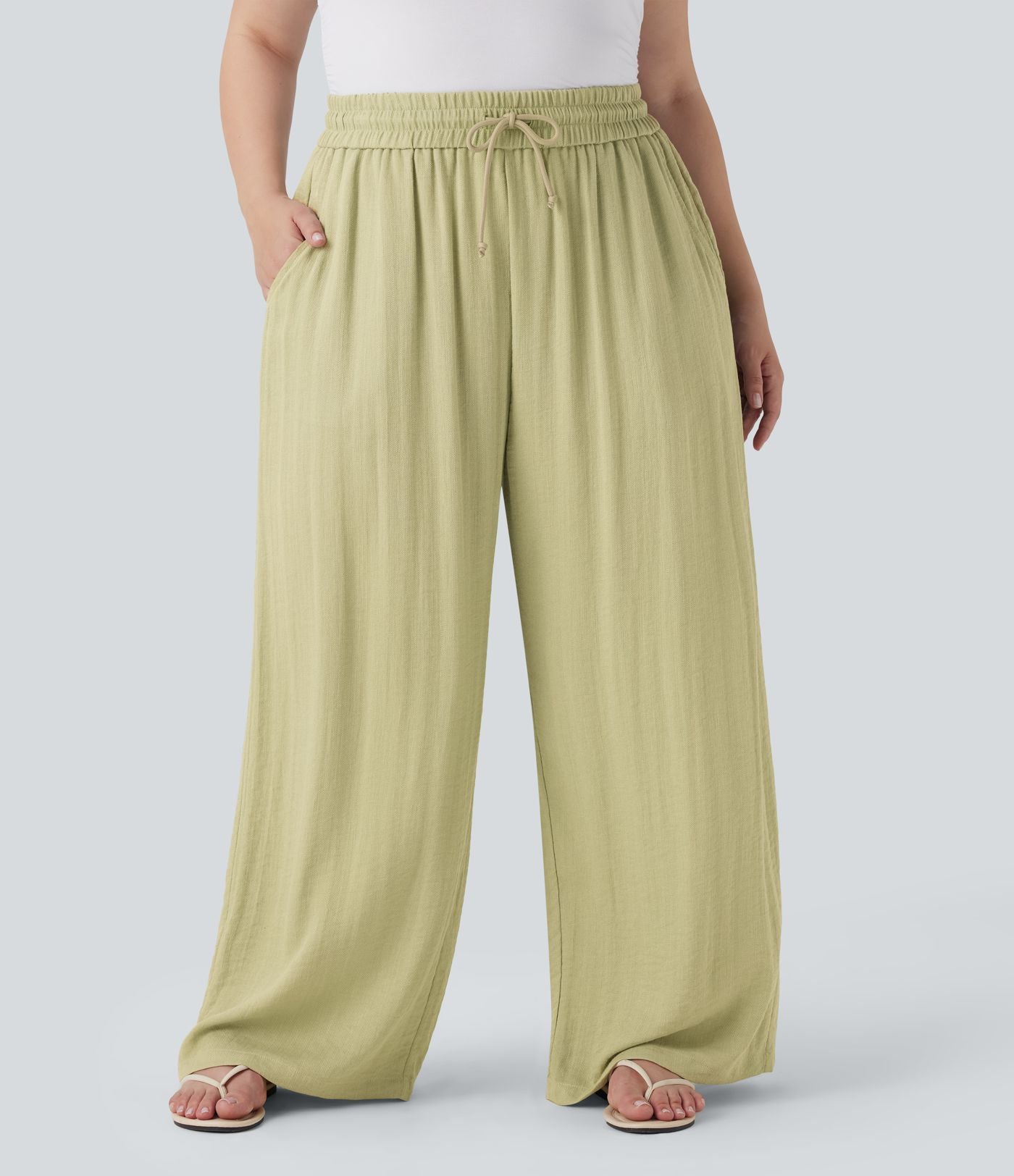 Pantalon décontracté grande taille large fluide taille haute effet lin avec cordon de serrage et poches