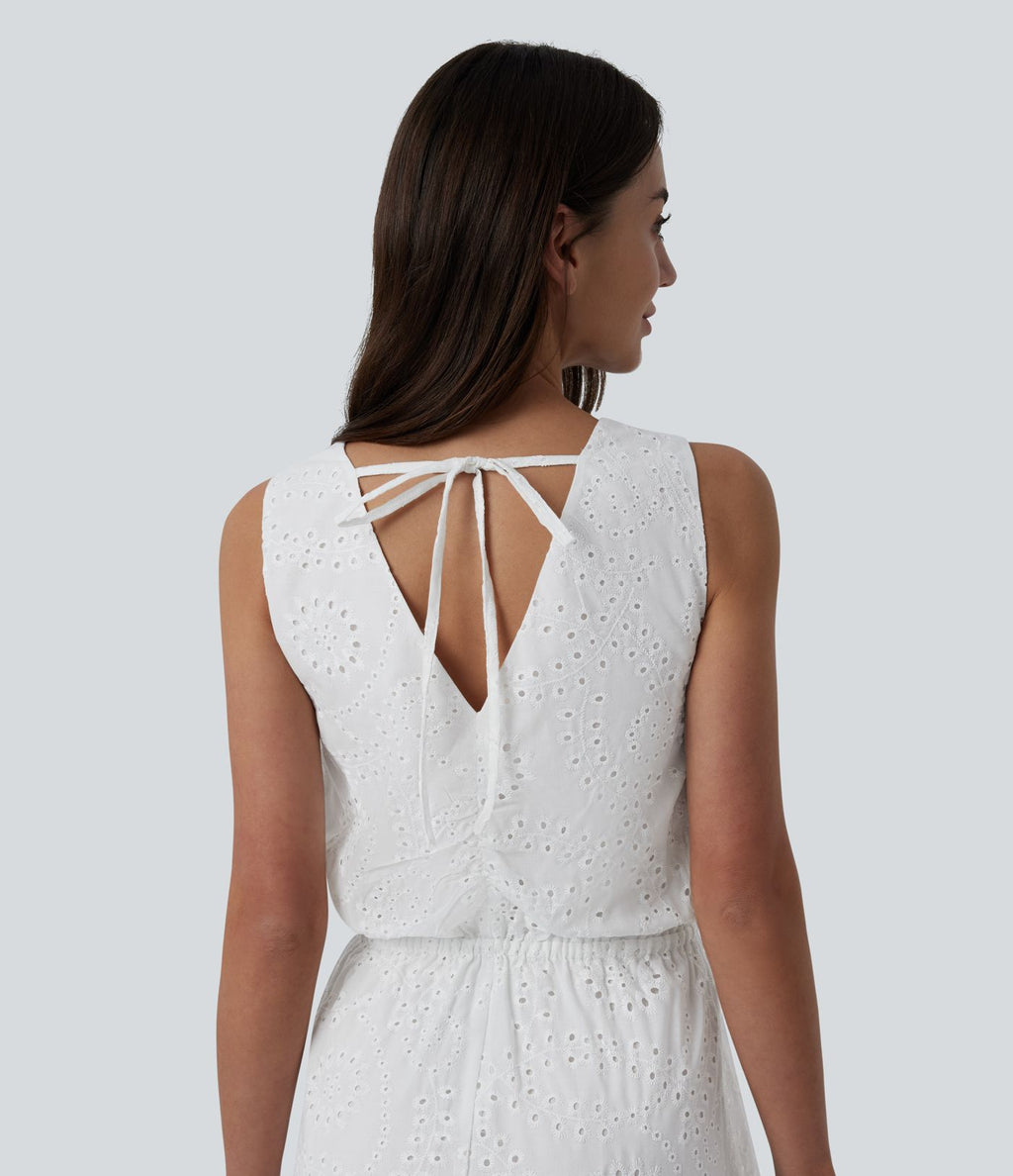 Robe mi-longue fluide col V sans manches avec nœud au dos