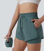 Short running 2-en-1 taille haute avec cordon de serrage et poches