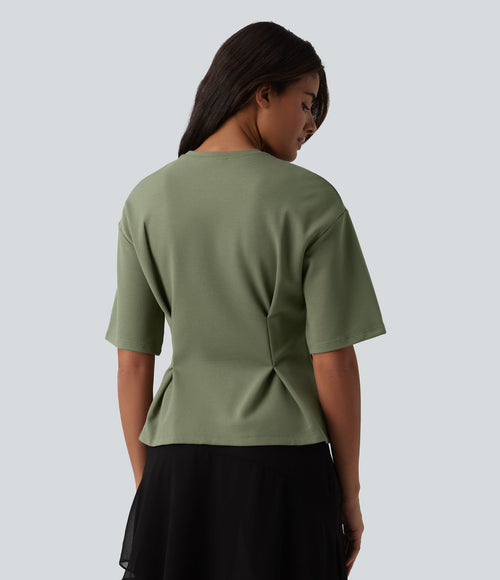 Blouse casual col rond taille cintrée à basque