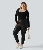 Legging grande taille en simili stretch doublé polaire, taille haute avec poches