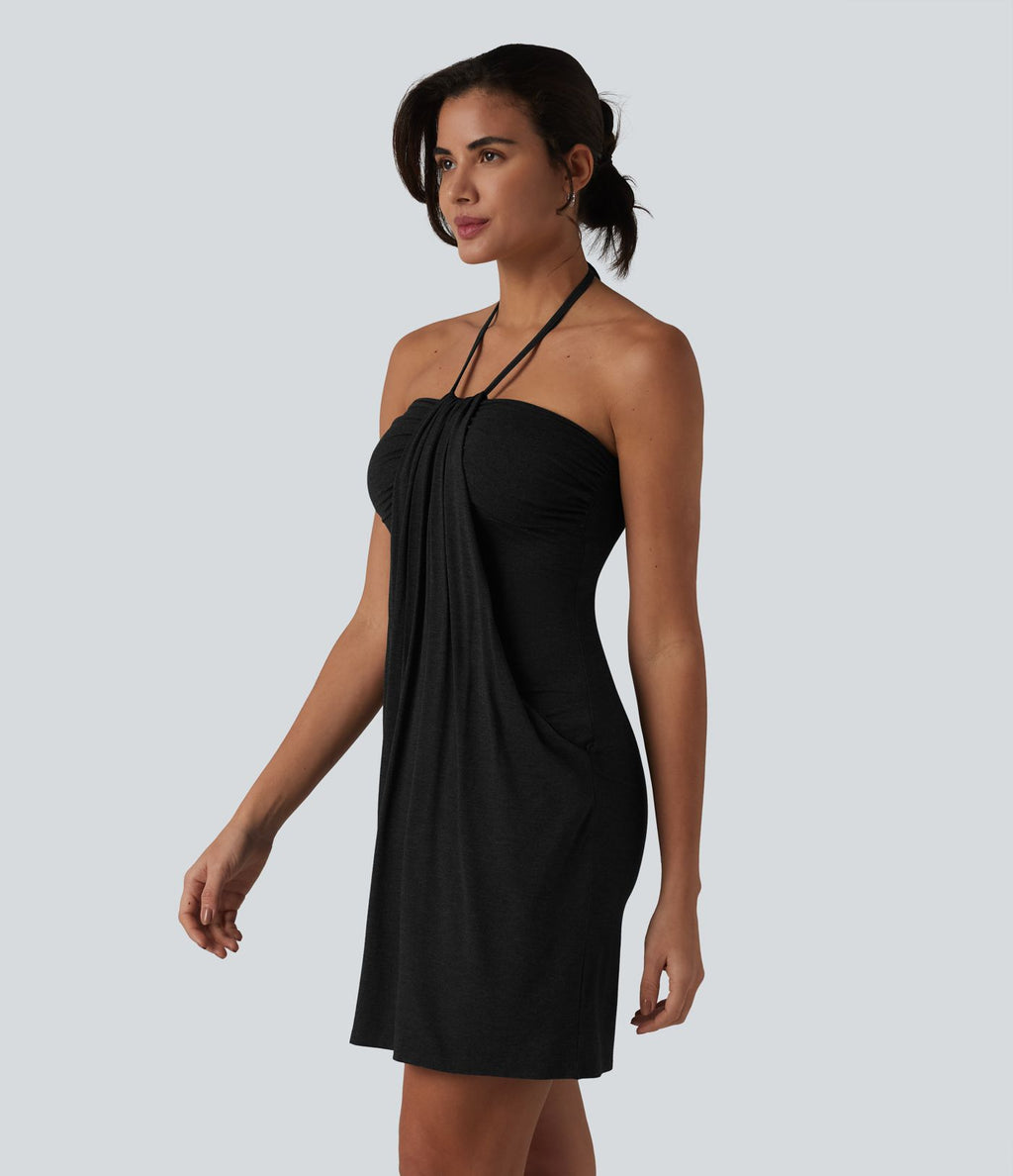 Robe resort mini dos nu à col licou avec lien noué dans le dos et poches