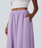 Pantalon fluide large taille mi-haute effet lin avec poche