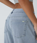Halara Flex™ Jean large asymétrique taille basse avec bouton, fermeture éclair et poches multiples, délavé et extensible en maille