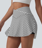 Jupe de tennis mini 2 en 1 à rayures, taille haute croisée, ourlet arrondi et poches