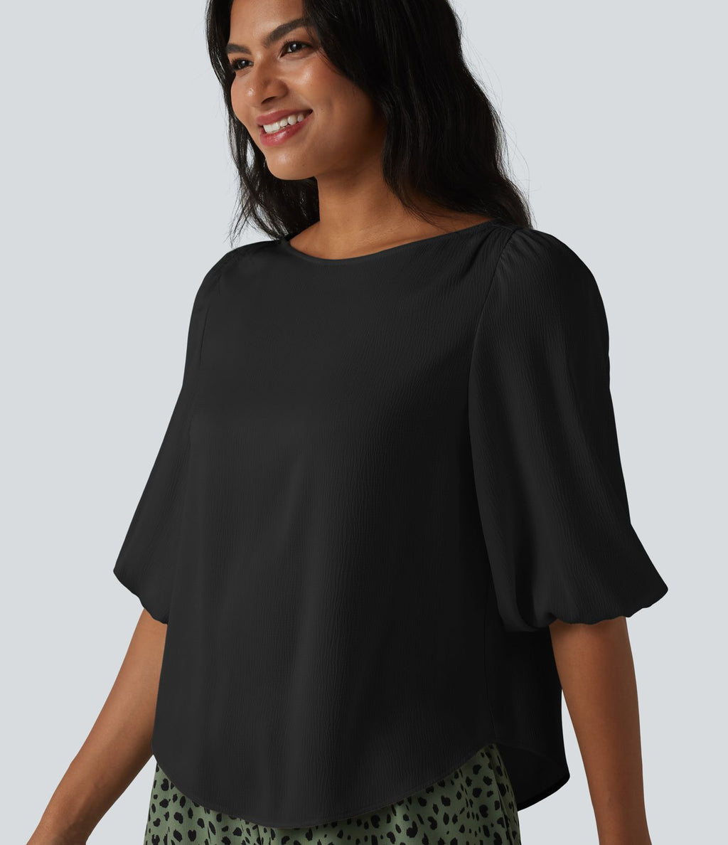 Blouse décontractée à manches bouffantes et ourlet arrondi texturé