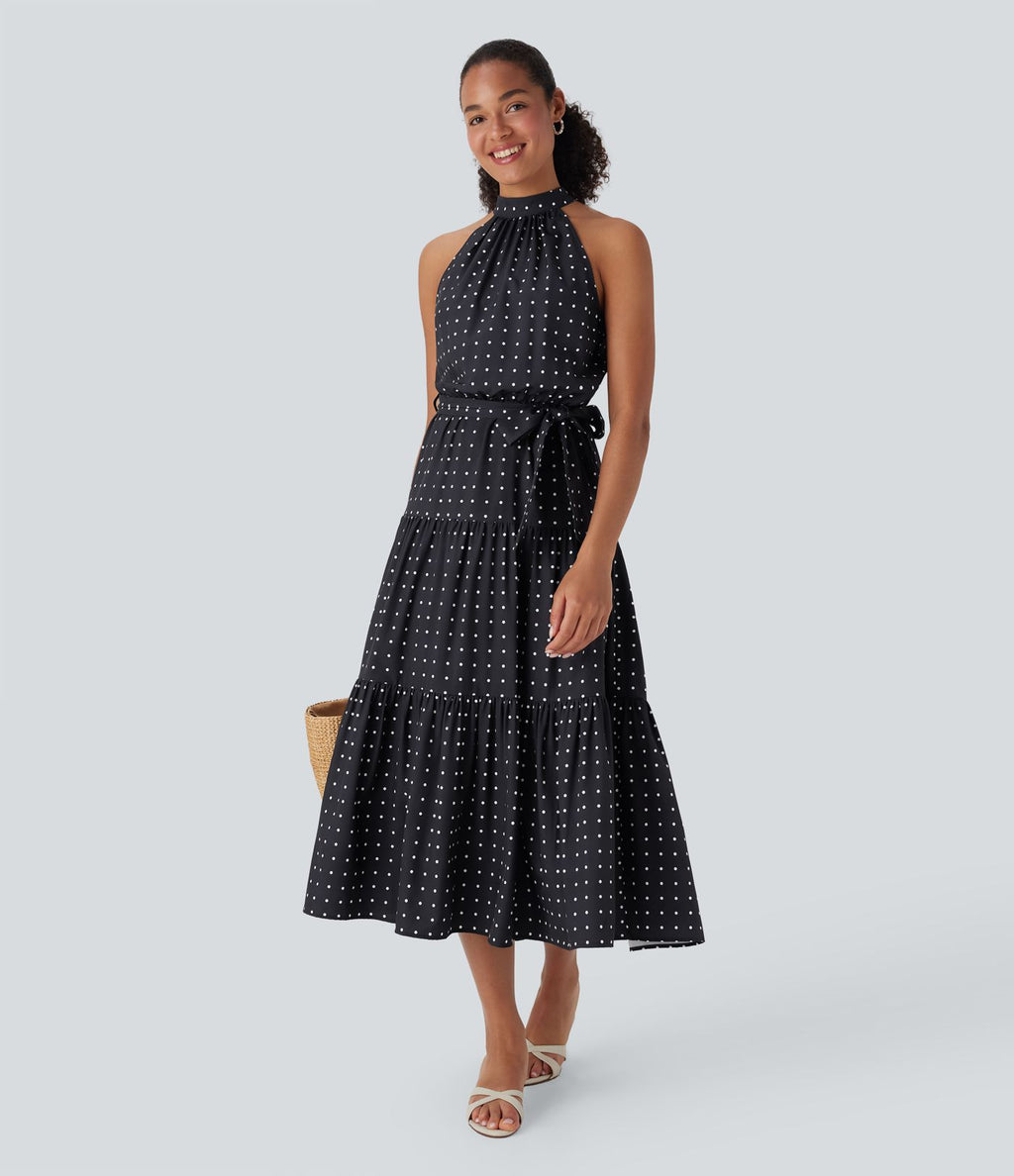 Robe mi-longue fluide de vacances à pois avec col licou, découpe dos, ceinture et poches latérales