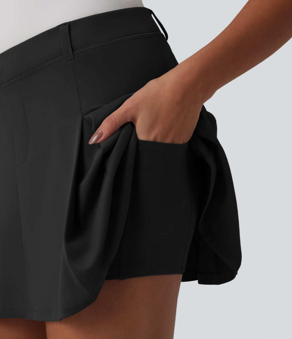 Jupe mini de golf plissée 2-en-1 DayStretch asymétrique taille mi-haute avec poches