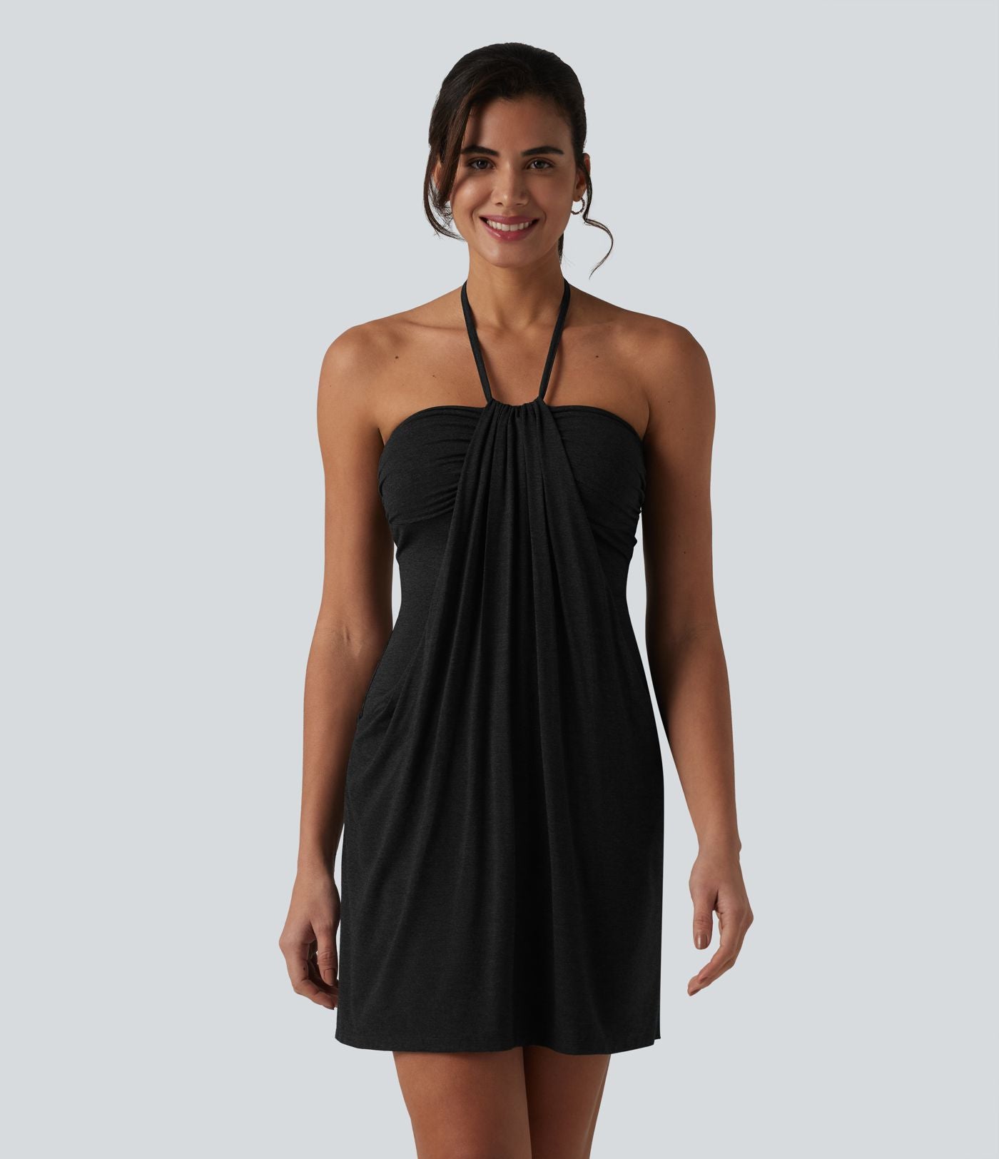 Robe resort mini dos nu à col licou avec lien noué dans le dos et poches