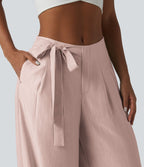 Pantalon large fluide taille haute en lin mélangé avec poches et liens latéraux