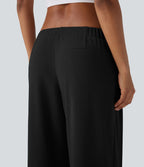 Pantalon décontracté taille basse à jambes larges en tissu gaufré avec poches latérales