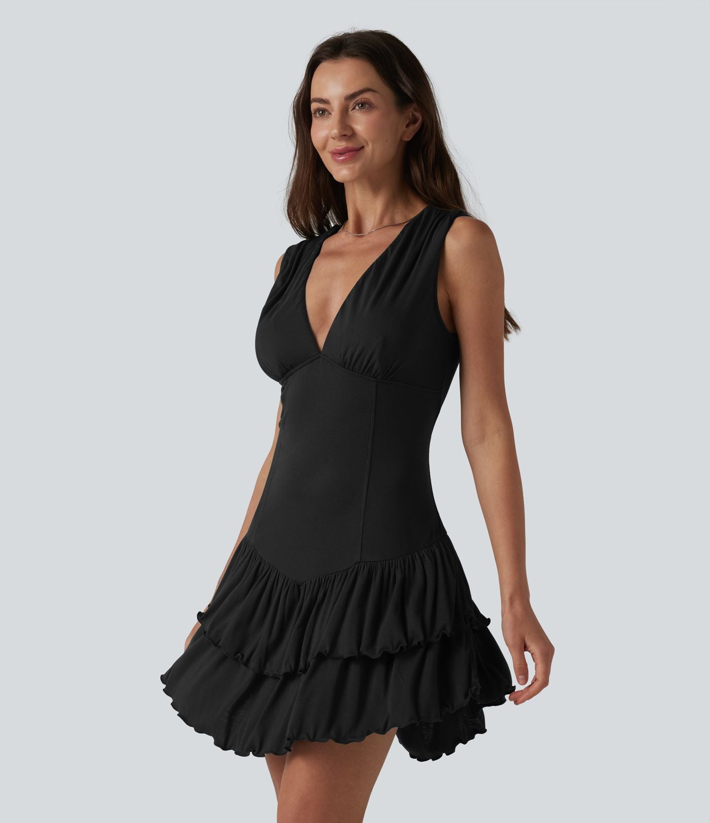 Robe mini en maille côtelée col V sans manches ourlet à volants superposés