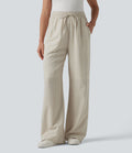 Pantalon tailleur large en lin rayé taille haute avec cordon de serrage et poches