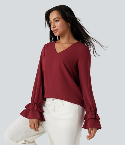 Blouse col V à volants manches longues