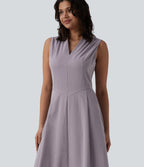Robe mi-longue plissée col V sans manches avec fermeture éclair invisible et poches pour le travail