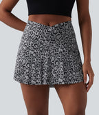 Jupe-short de tennis mini taille haute croisée imprimé léopard avec poches